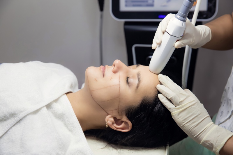 Woman getting laser therapy