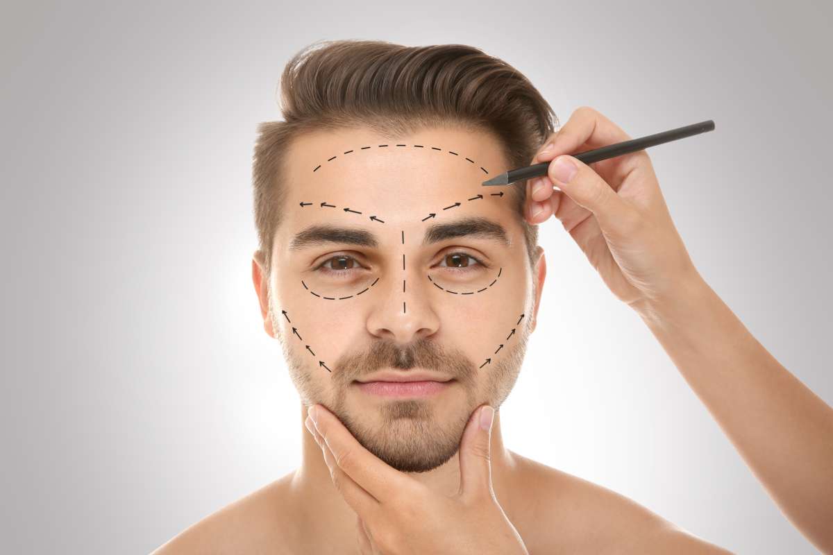 A man being prepped for plastic surgery