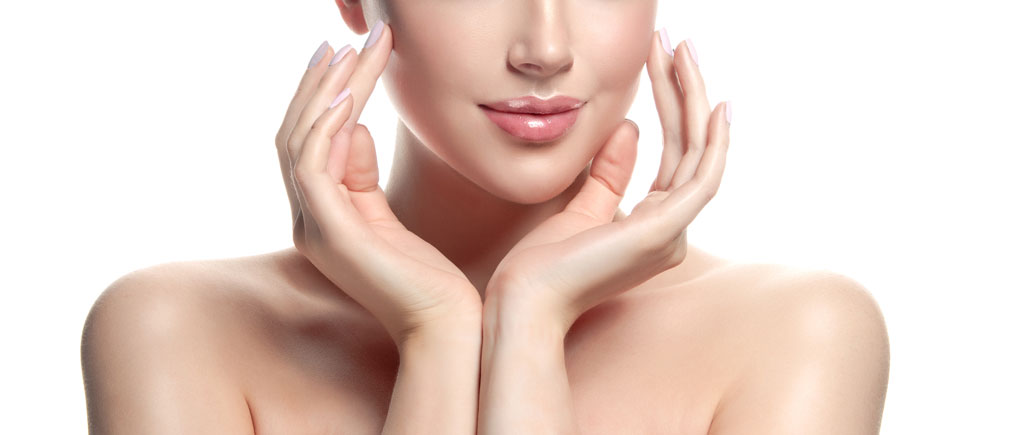 Young woman touching the lower half of her face
